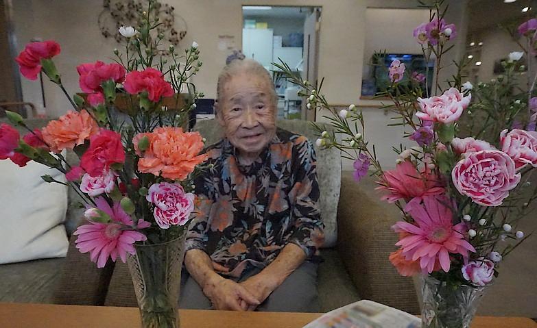 お花で輝く笑顔